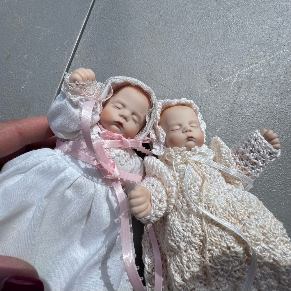Set of Two Antique Porcelain Baby Dolls with Antique carriage